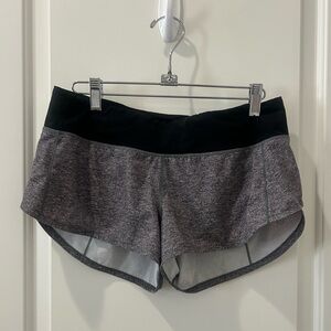Lululemon shorts size 6. Grey with black waist. Excellent condition.